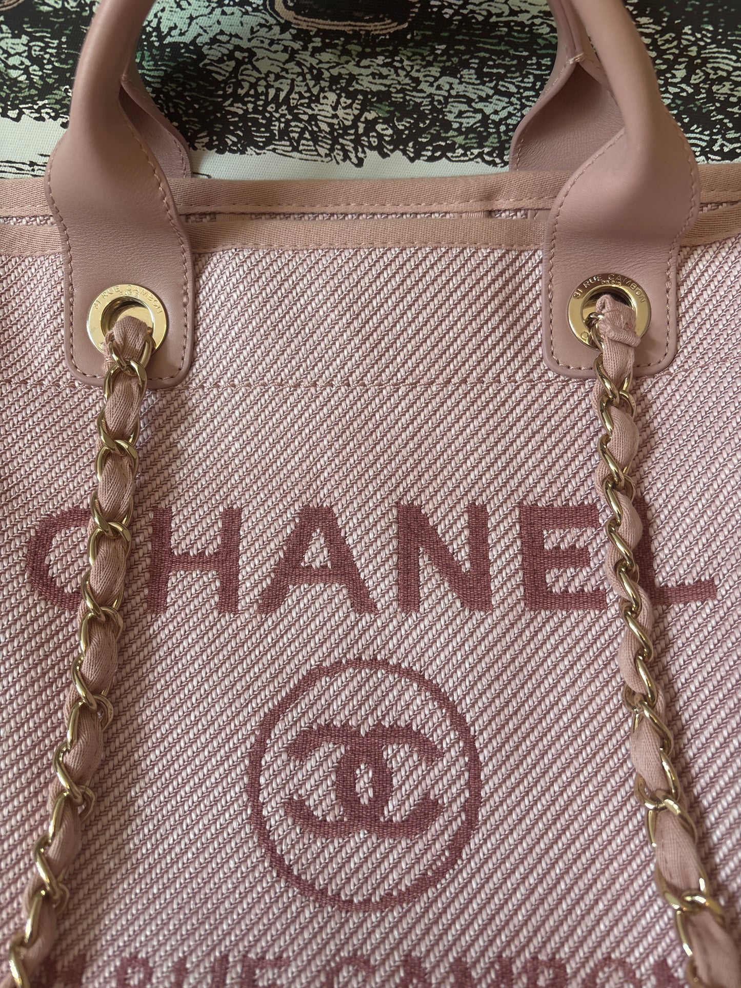 Close up of preowned Chanel Logo to the front