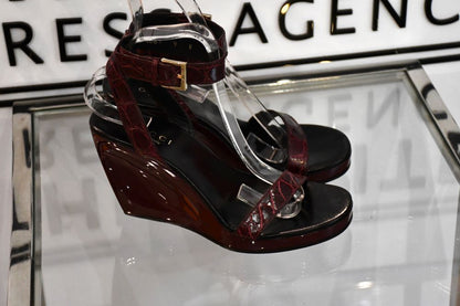 profile ankle strap of Gucci Burgundy Wedge Sandals
