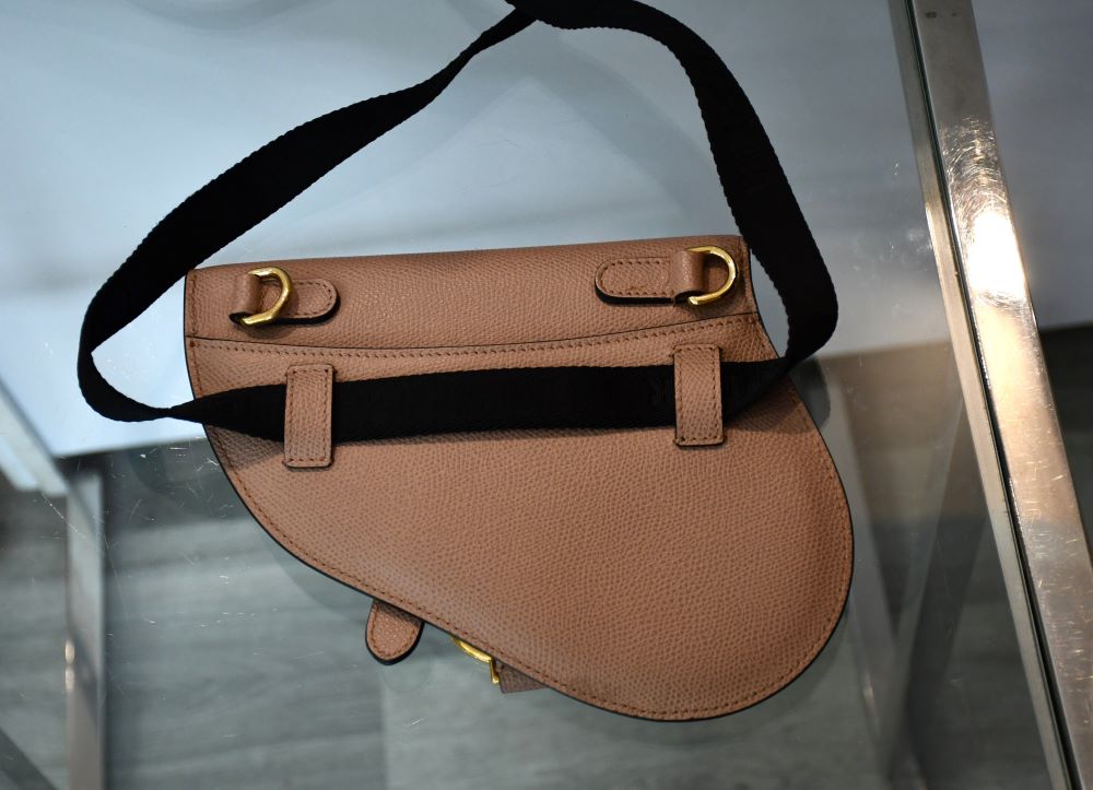 back of preloved Christian Dior Blush Saddle Leather mini belt bag