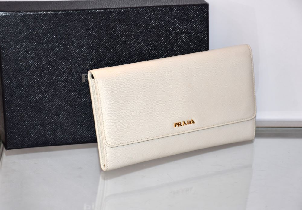 preowned Prada Saffiano Leather Off White Clutch with box