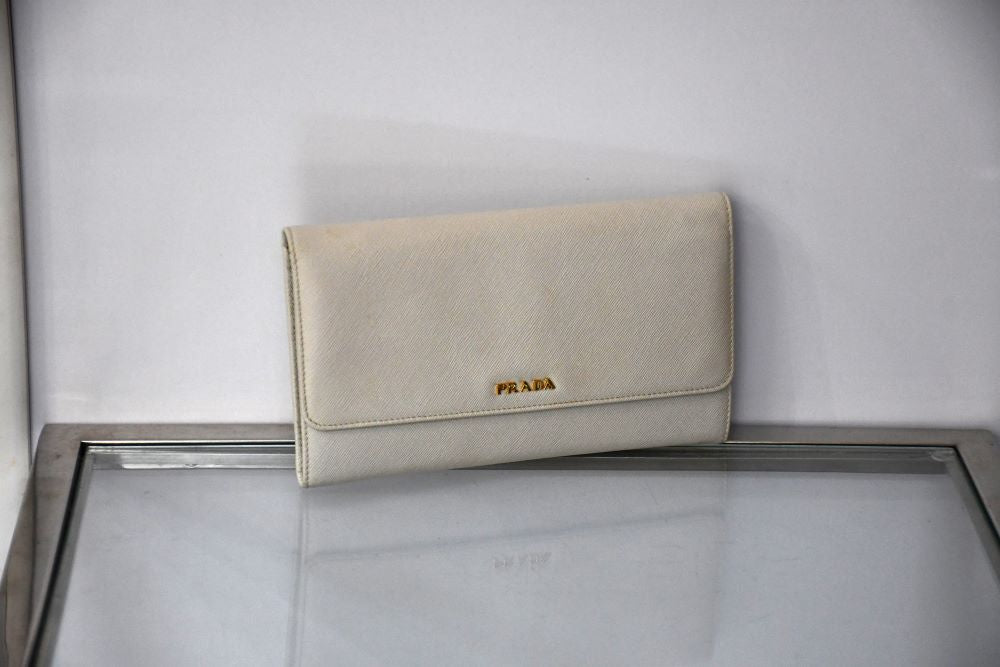 preowned Prada Saffiano unused Off White wallet Clutch
