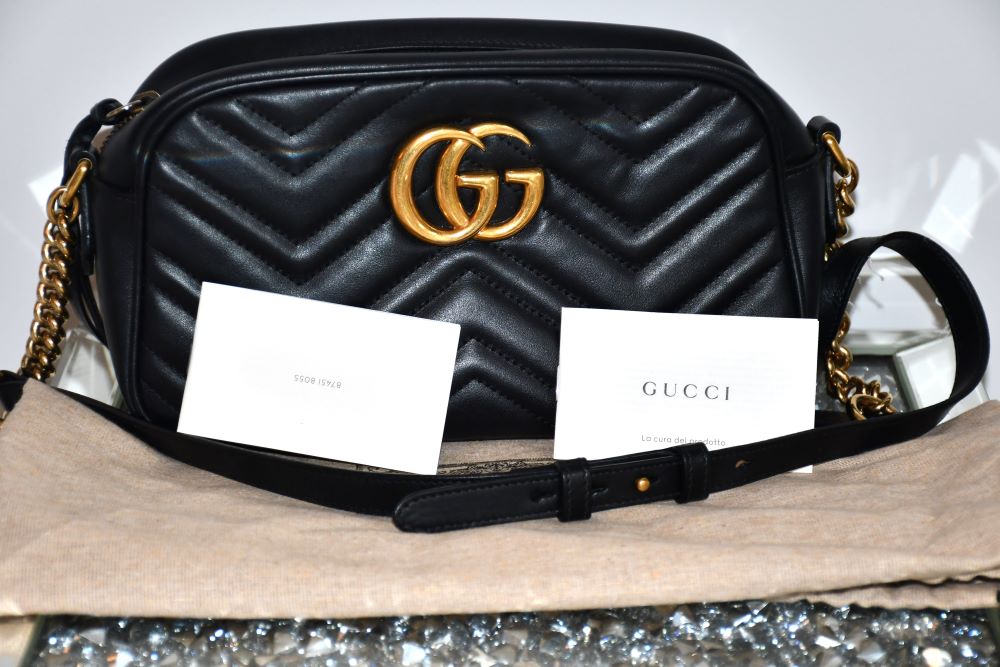 preloved Gucci GG Marmont Leather Crossbody Bag on dustbag with cards
