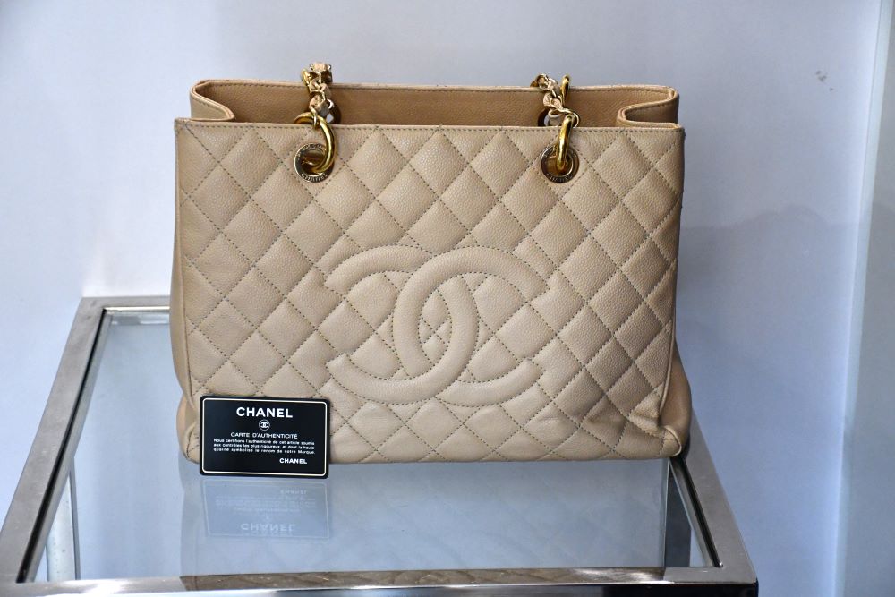 Large preowned Coco Chanel Beige GST Grand Tote Shopping Leather CC Bag