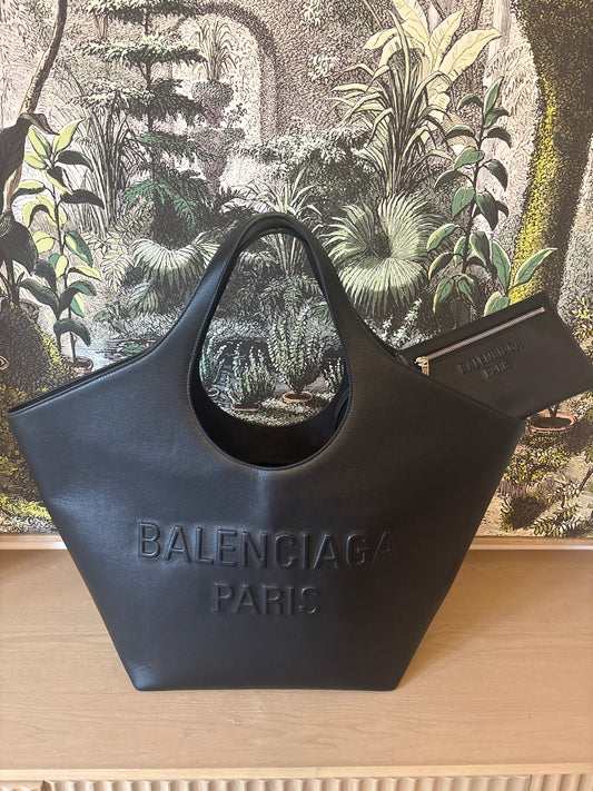 Black Balenciaga leather tote bag with embossed logo front view 