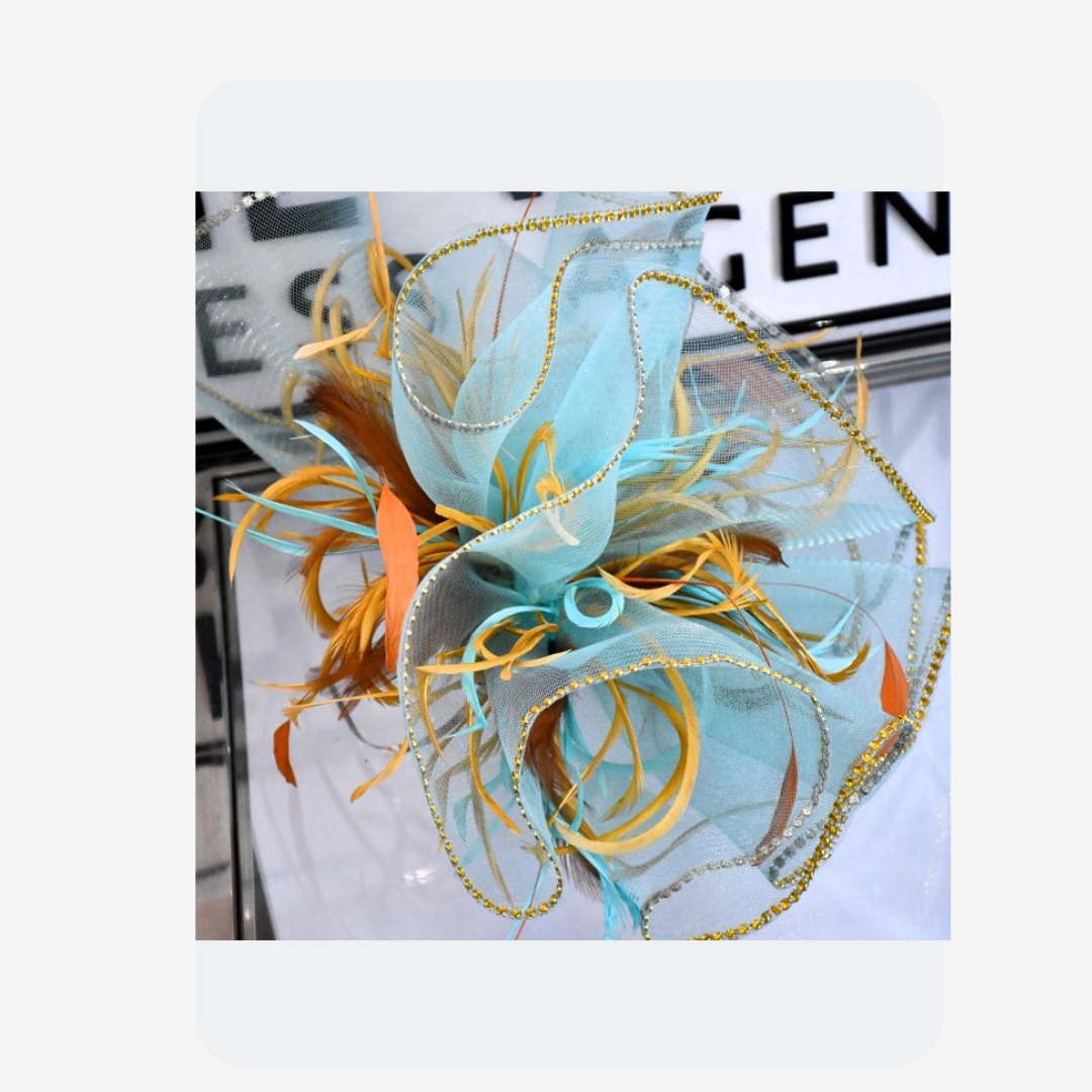 Handcrafted Pale Blue Net and Feather Fascinator