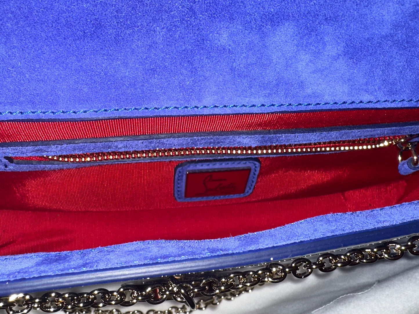 Preowned unused Louboutin Riviera Blue Clutch. NEW