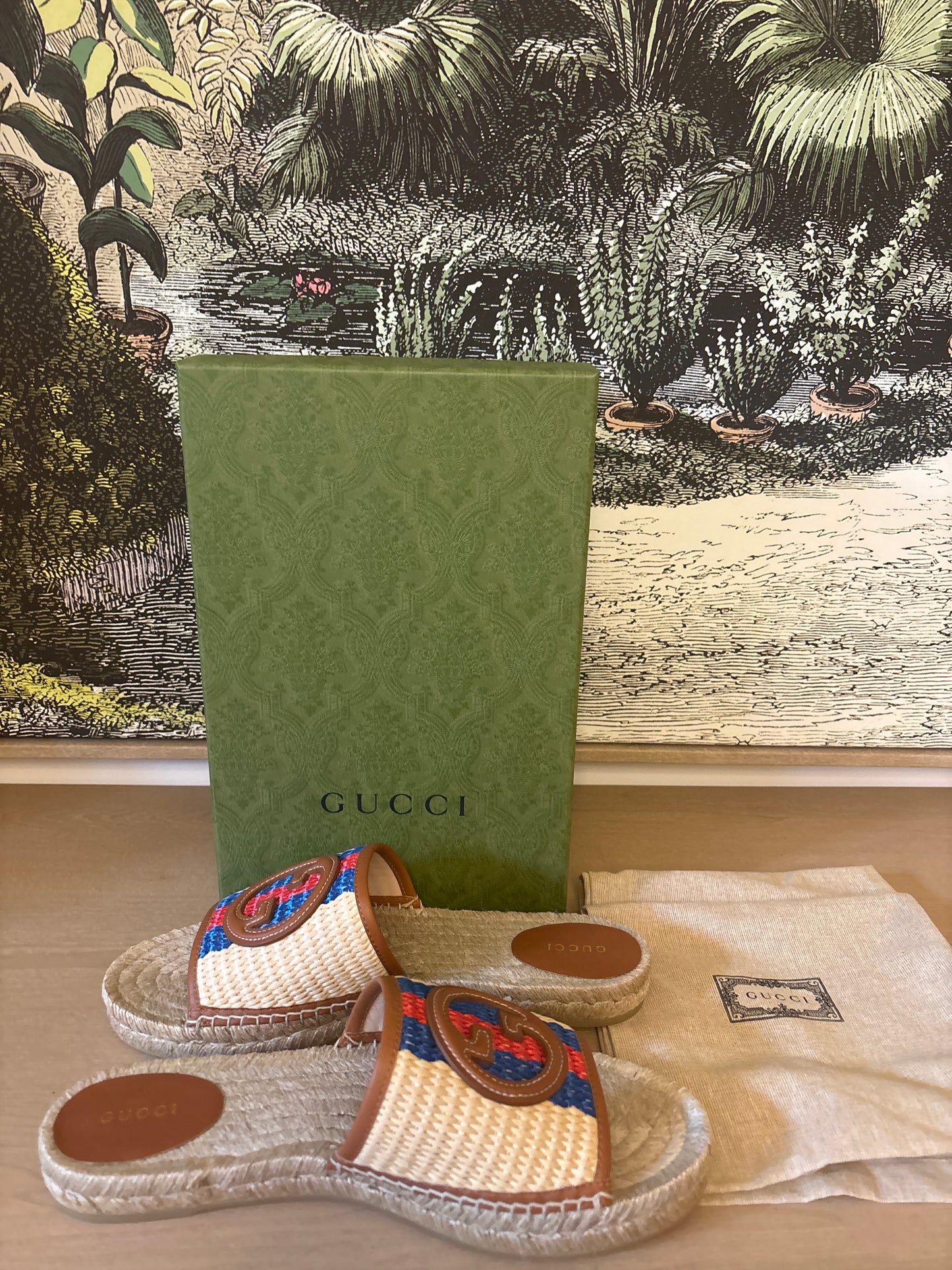Gucci Interlocking GG Raffia Espadrille Slide Sandals.