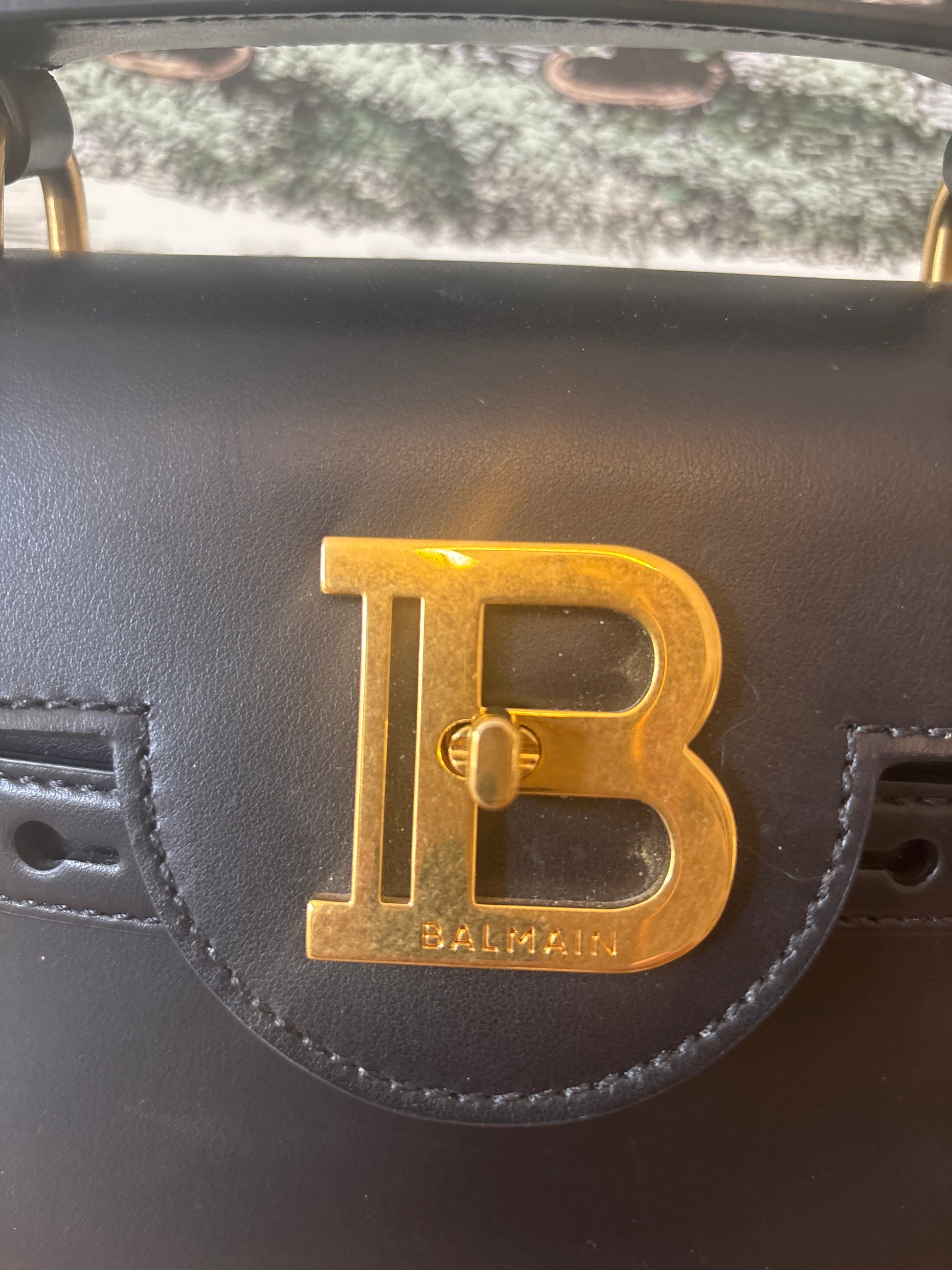 Balmain gold tone logo plaque 