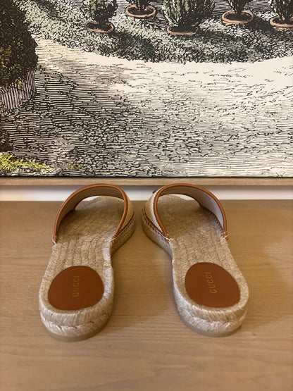 Gucci Interlocking GG Raffia Espadrille Slide Sandals.