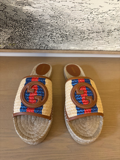 Gucci Interlocking GG Raffia Espadrille Slide Sandals.
