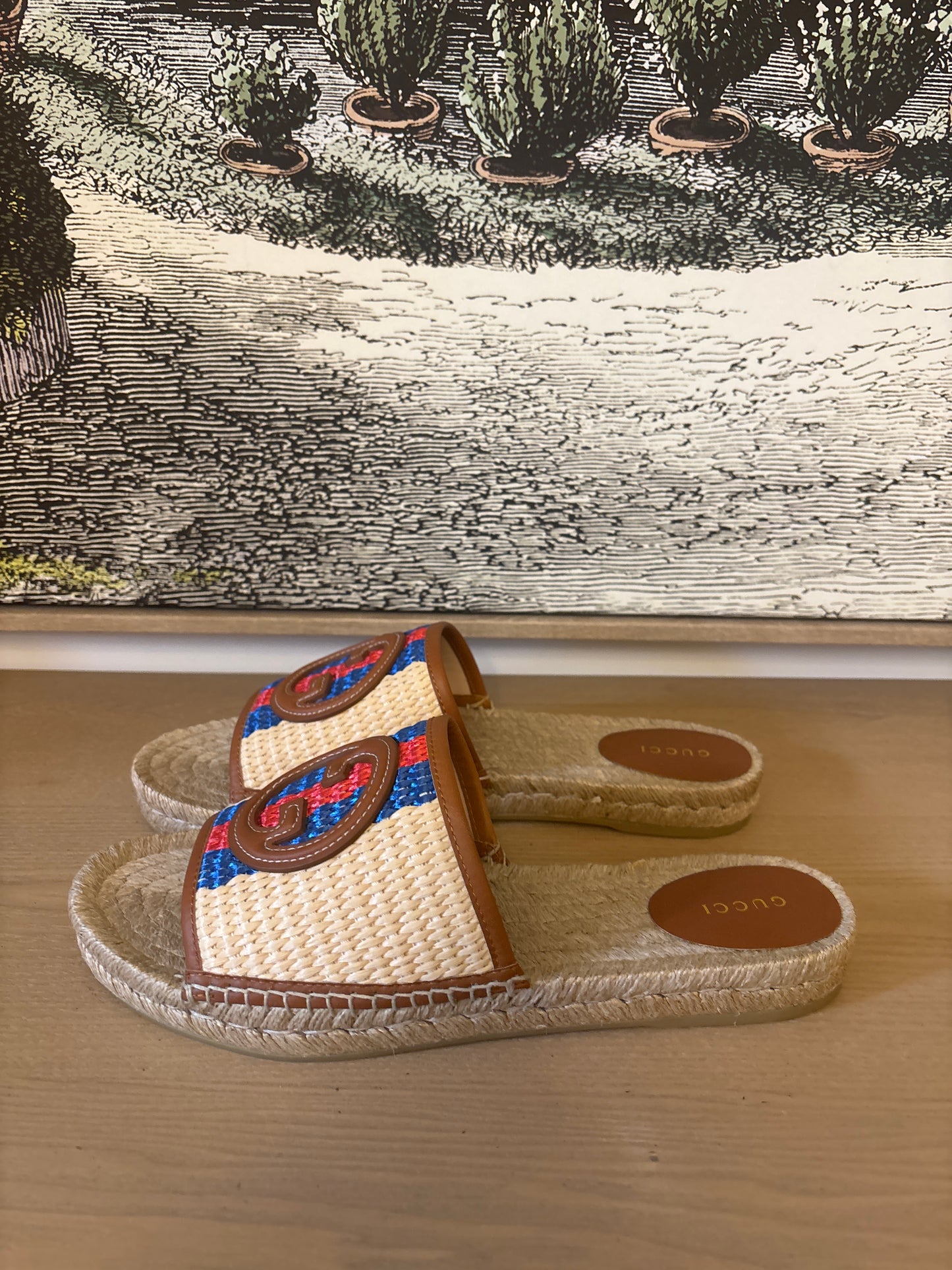 Gucci Interlocking GG Raffia Espadrille Slide Sandals.