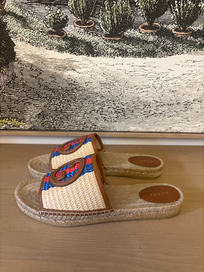Gucci Interlocking GG Raffia Espadrille Slide Sandals.