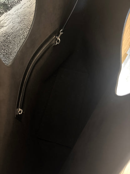 Suede interior with zip pocket 