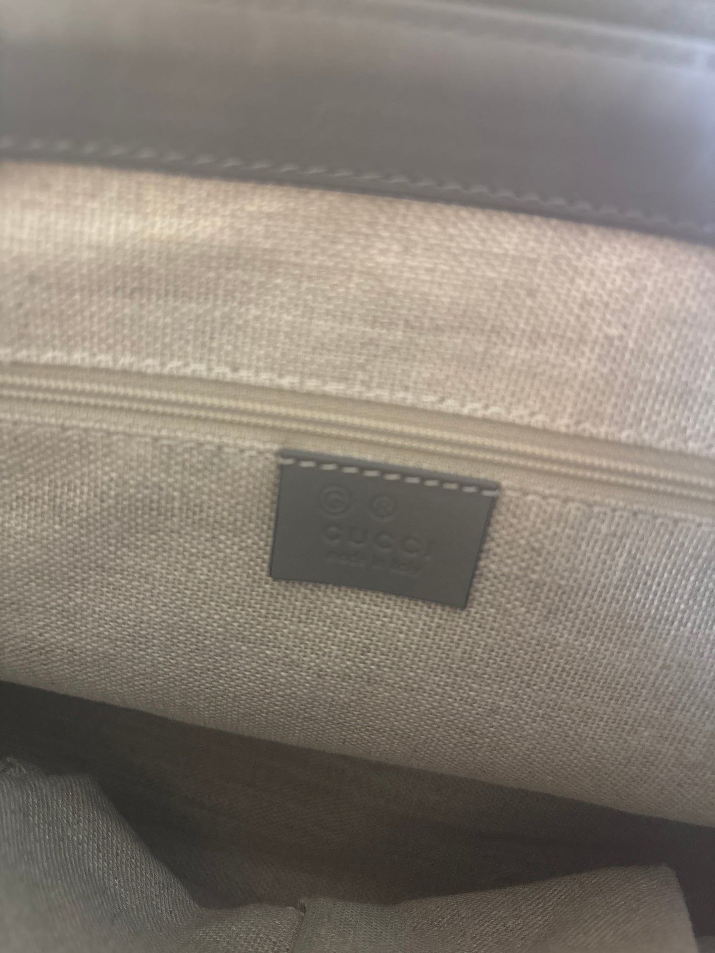 Interior Oatmeal Linen showing the Gucci Label 