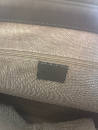 Interior Oatmeal Linen showing the Gucci Label 
