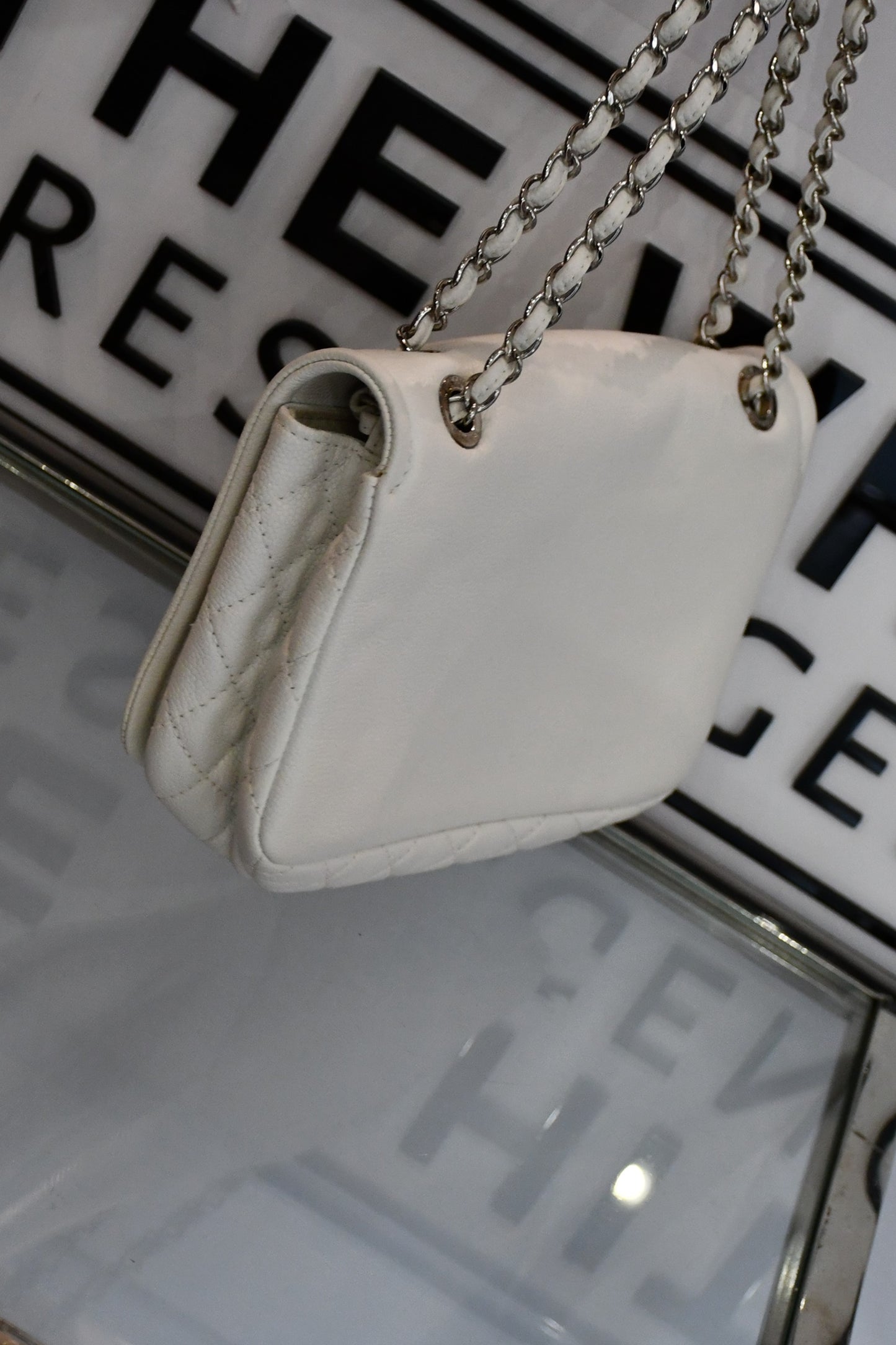 side view of Chanel Matrasse Calf Leather White Bag