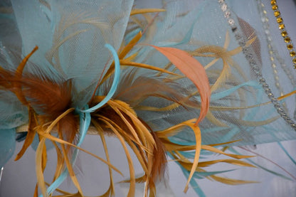 Handcrafted Pale Blue Net and Feather Fascinator