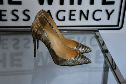 profile of Louboutin Pigalle Follies 100 Glitter Sirene Shoes