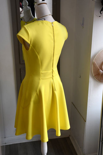 back of preowned Ted Baker Bright Yellow Skater Dress 