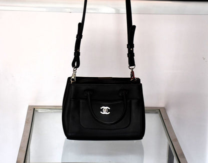 Pre owned Black Chanel handbag with a visible brand logo with shoulder strap