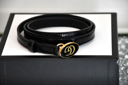 preowned Gucci Black leather belt with a gold buckle on a white box