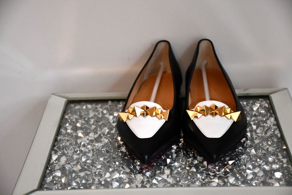 front view of Louboutin Miss Constella Flat black and white leather Shoes