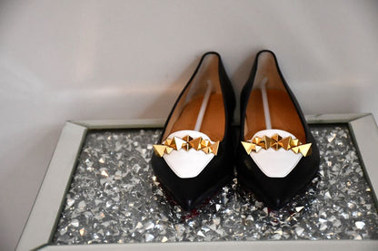 front view of Louboutin Miss Constella Flat black and white leather Shoes