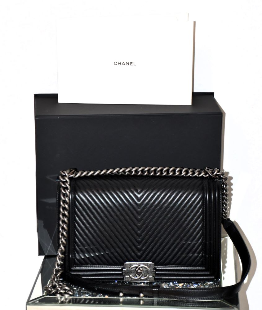 preloved Chanel Chevron Lambs Leather On Chain Boy Bag infront of box