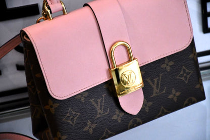 close up of preloved Louis Vuitton Locky BB Monogram Canvas and Rose Poudre Leather Crossbody