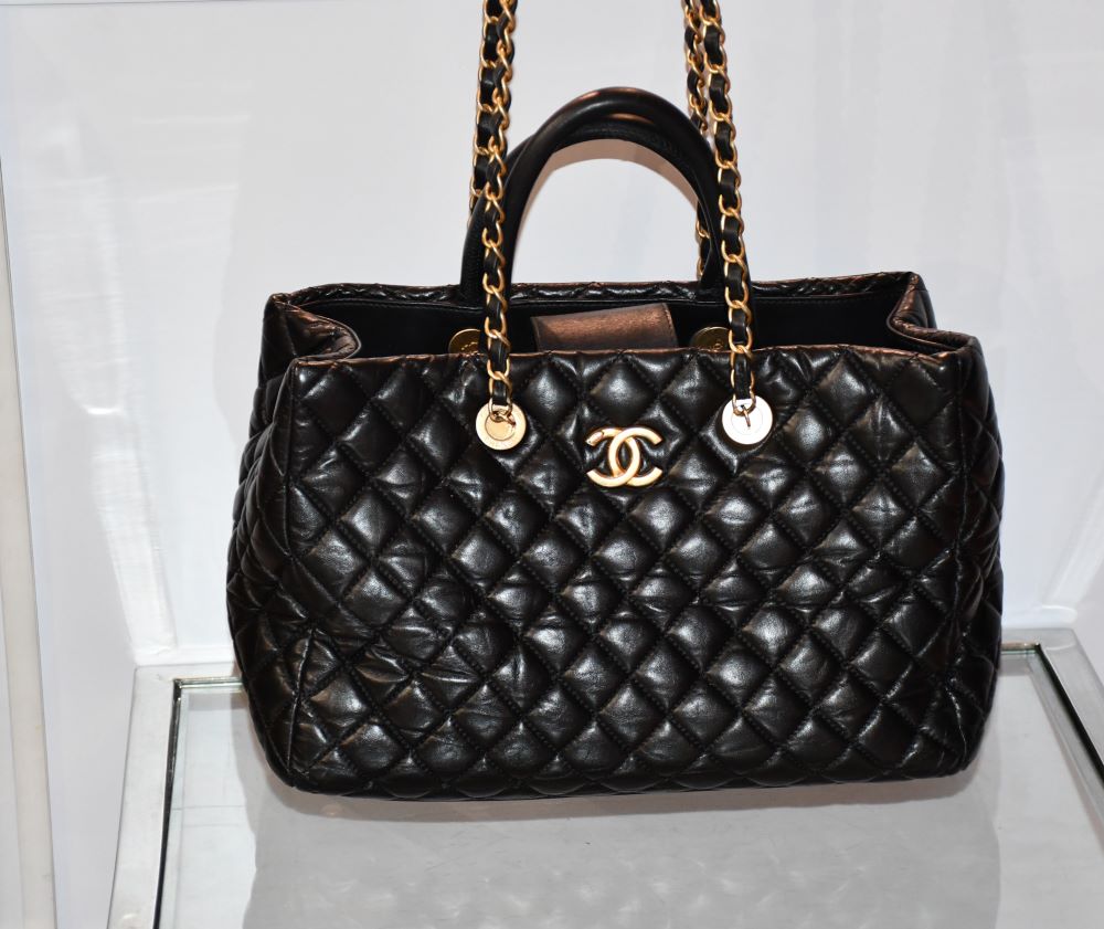 close up of Chanel CoCo Black Quilted Top Handle Medium Tote Handbag