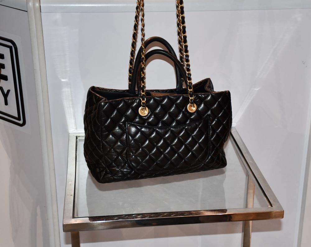 back of preloved Chanel CoCo Black Quilted Top Handle Medium Tote Handbag