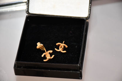 pre owned Chanel Interlocking CC Sculpted Gold Plated  clip on Earrings