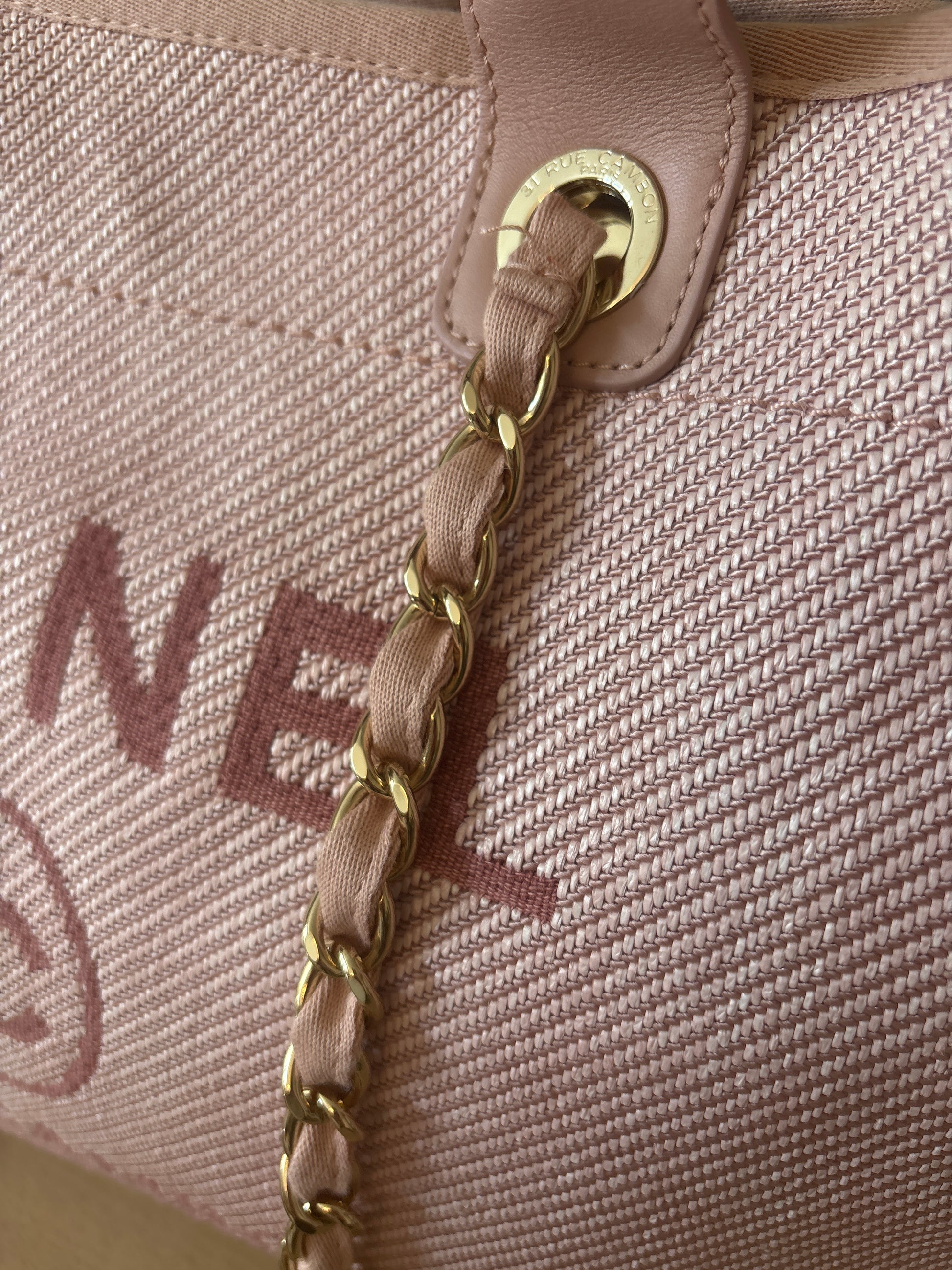 Authentic Chanel long shoulder straps showing hardware detail 