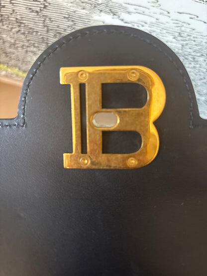 Inside of the Balmain logo plaque 