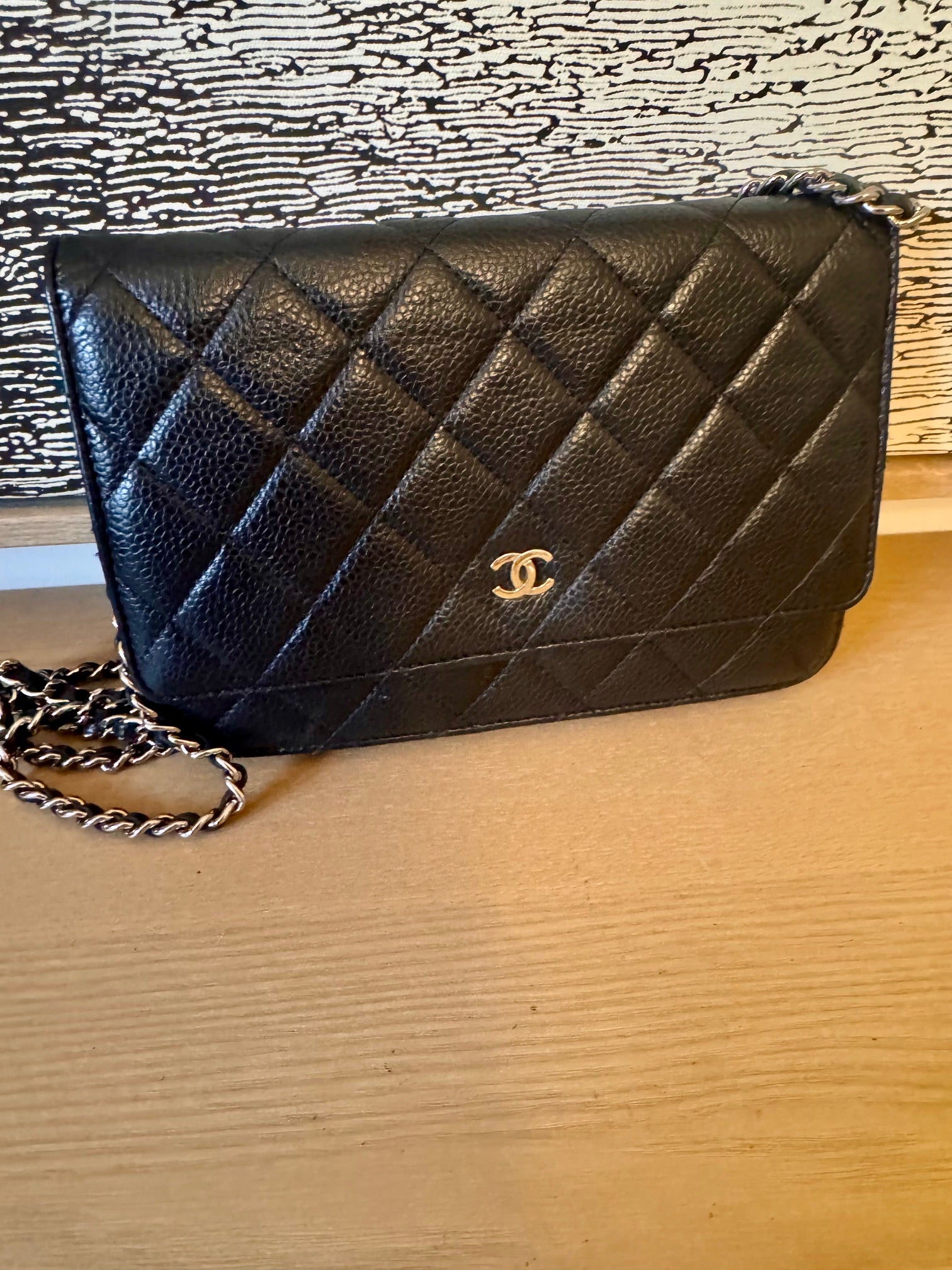 front of preloved  Chanel Wallet on a Chain quilted leather Bag
