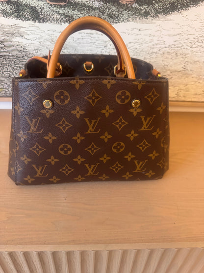back of preloved Louis Vuitton Montaigne PM Monogram Bag